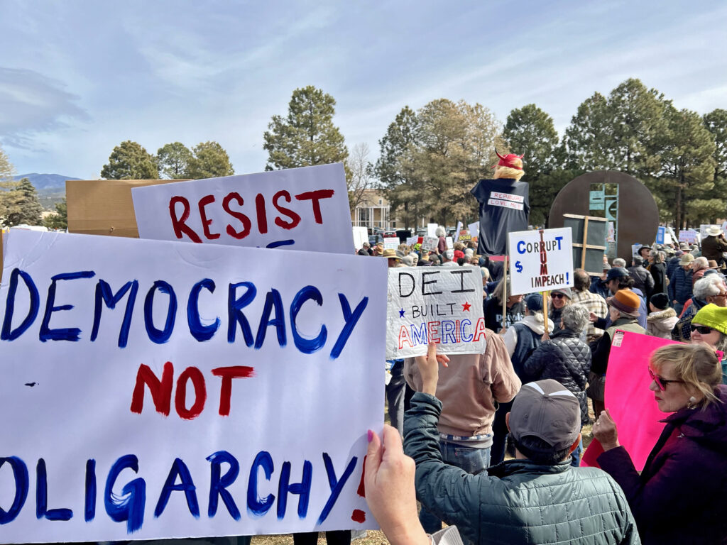 More than 500 people gathered outside the Roundhouse on Monday, with the crowd spilling onto nearby streets, to protest the Trump administration’s actions.