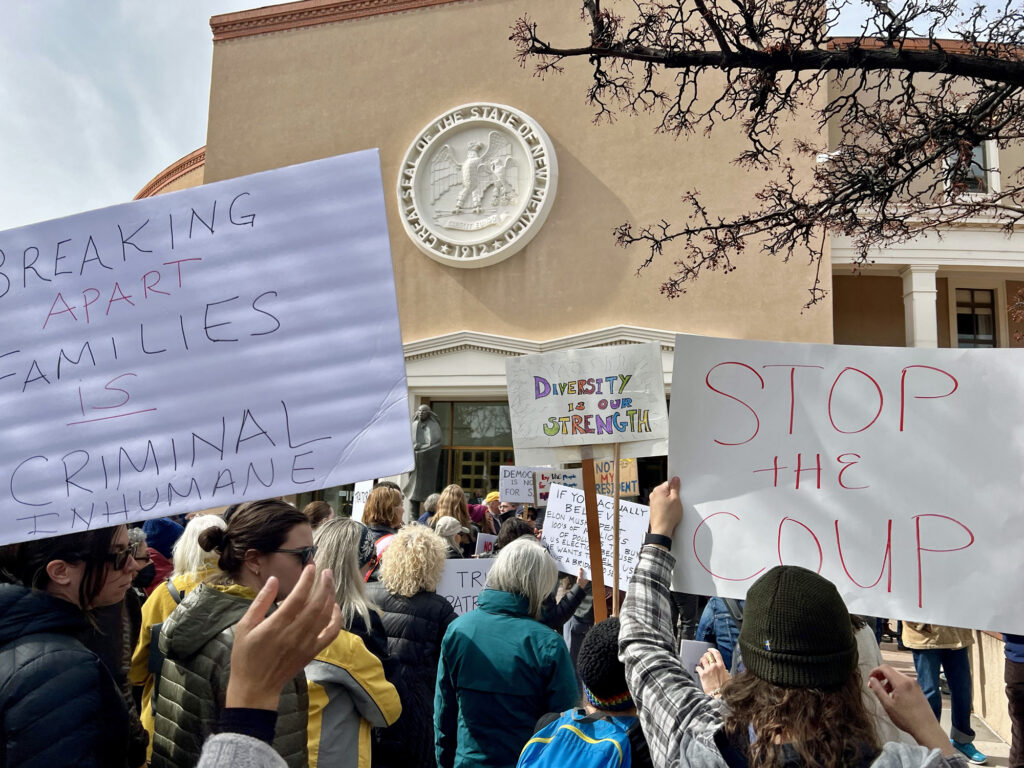 More than 500 people gathered outside the Roundhouse on Monday, with the crowd spilling onto nearby streets, to protest the Trump administration’s actions.