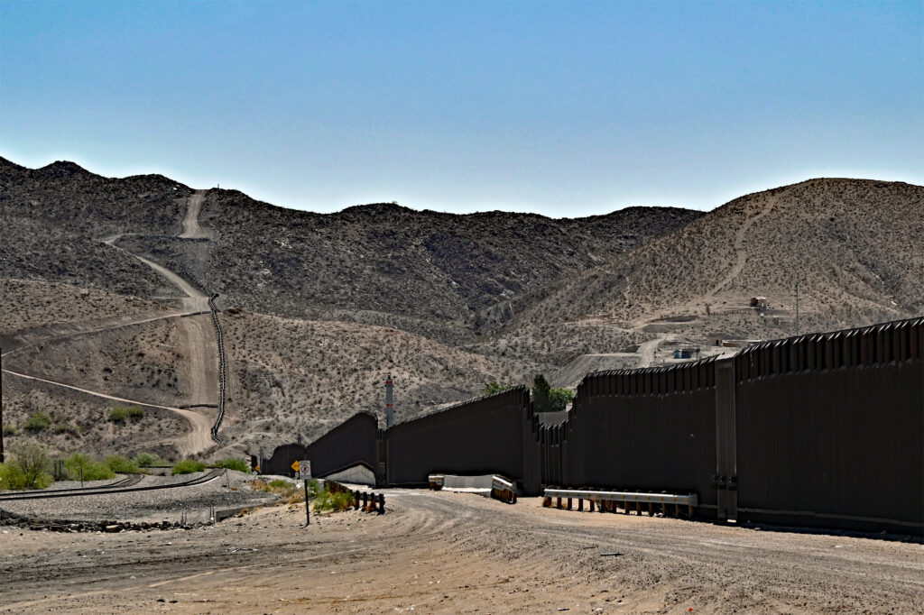 The border wall at Anapra. A 60-foot-deep stretch of land adjacent to the wall in this area is now part of the U.S. Army's Fort Huachuca.